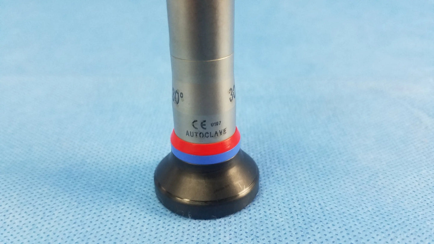 Silver surgical autoclave cystoscope with black base red and blue bands marked autocrave compatible olympus cystoscopic a22002a