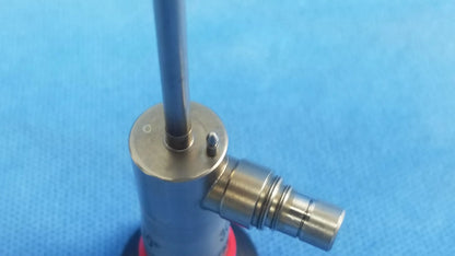 Silver-colored metal gas burner with cylindrical body and threaded side port compatible olympus cystoscopic a22002a