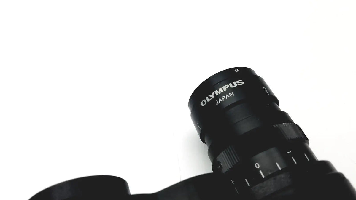 Black olympus japan microscope head wh10x-h/22 with matte finish and engraved branding on the lens body
