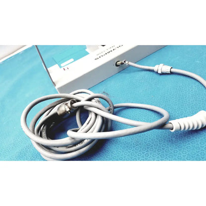 Gray coiled cable with metallic connectors and white spiral grip for olympus maj-1258 ues-40 pedal foot switch