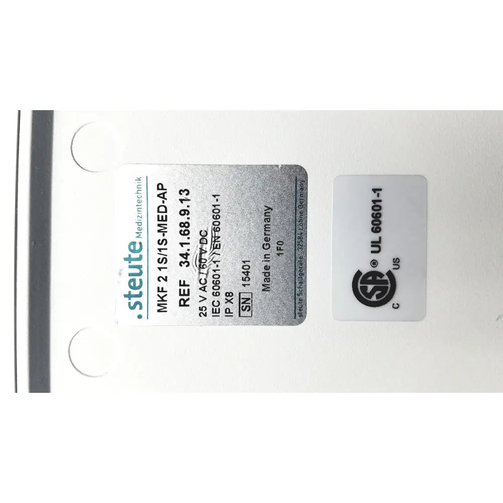 Silver metallic label with black text and logo detailing steute olympus maj-1258 ues-40 pedal foot switch product details
