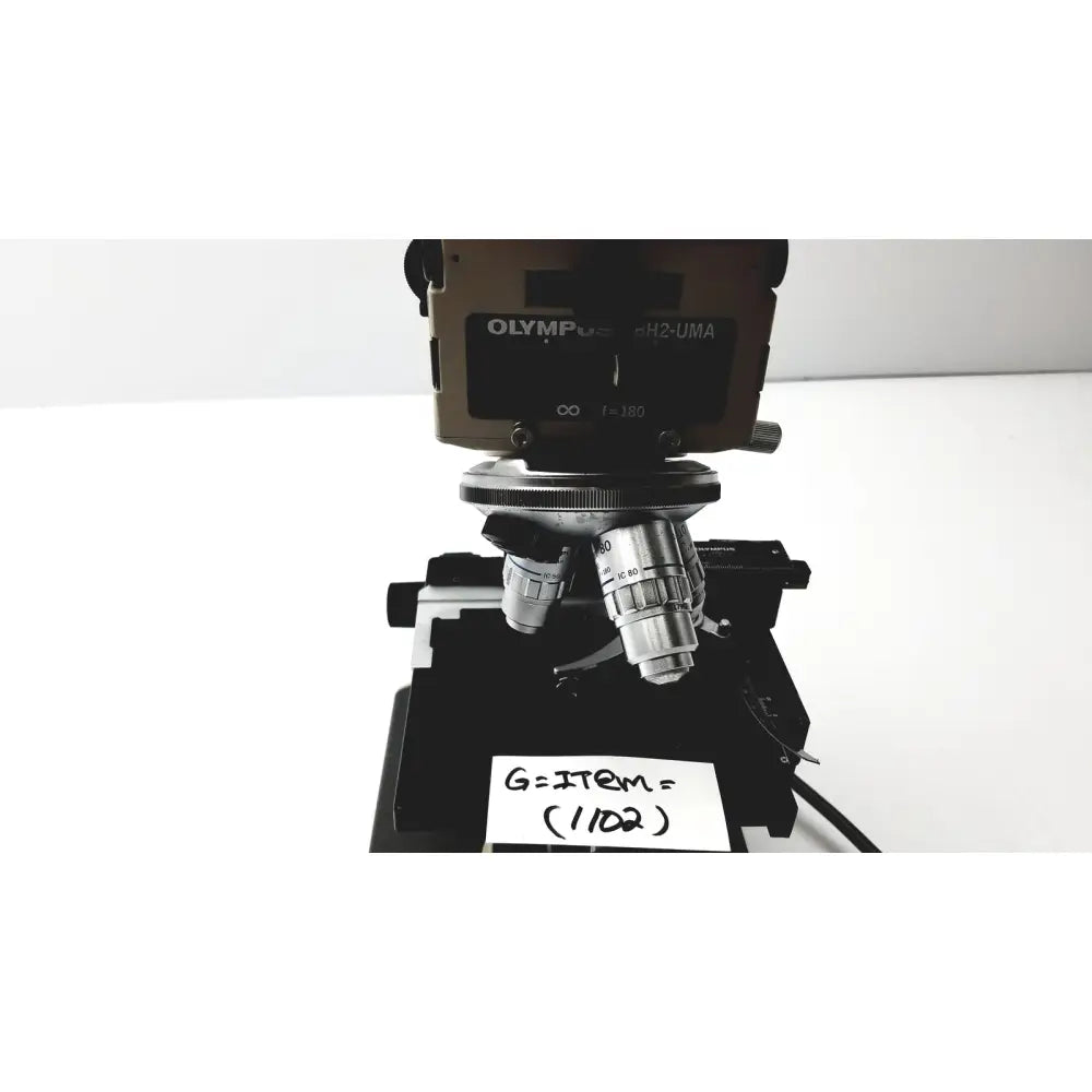 Olympus optical bh2-uma microscope with metallic silver and black components for precise laboratory analysis