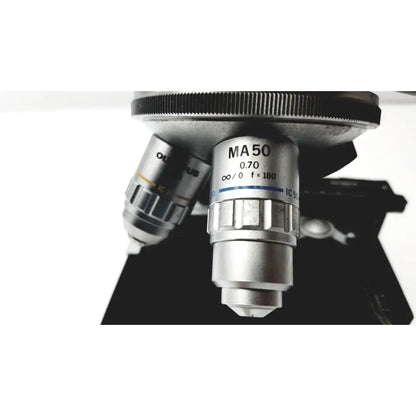 Silver olympus optical bh2-uma microscope objective lens with 0.70 numerical aperture and metallic finish