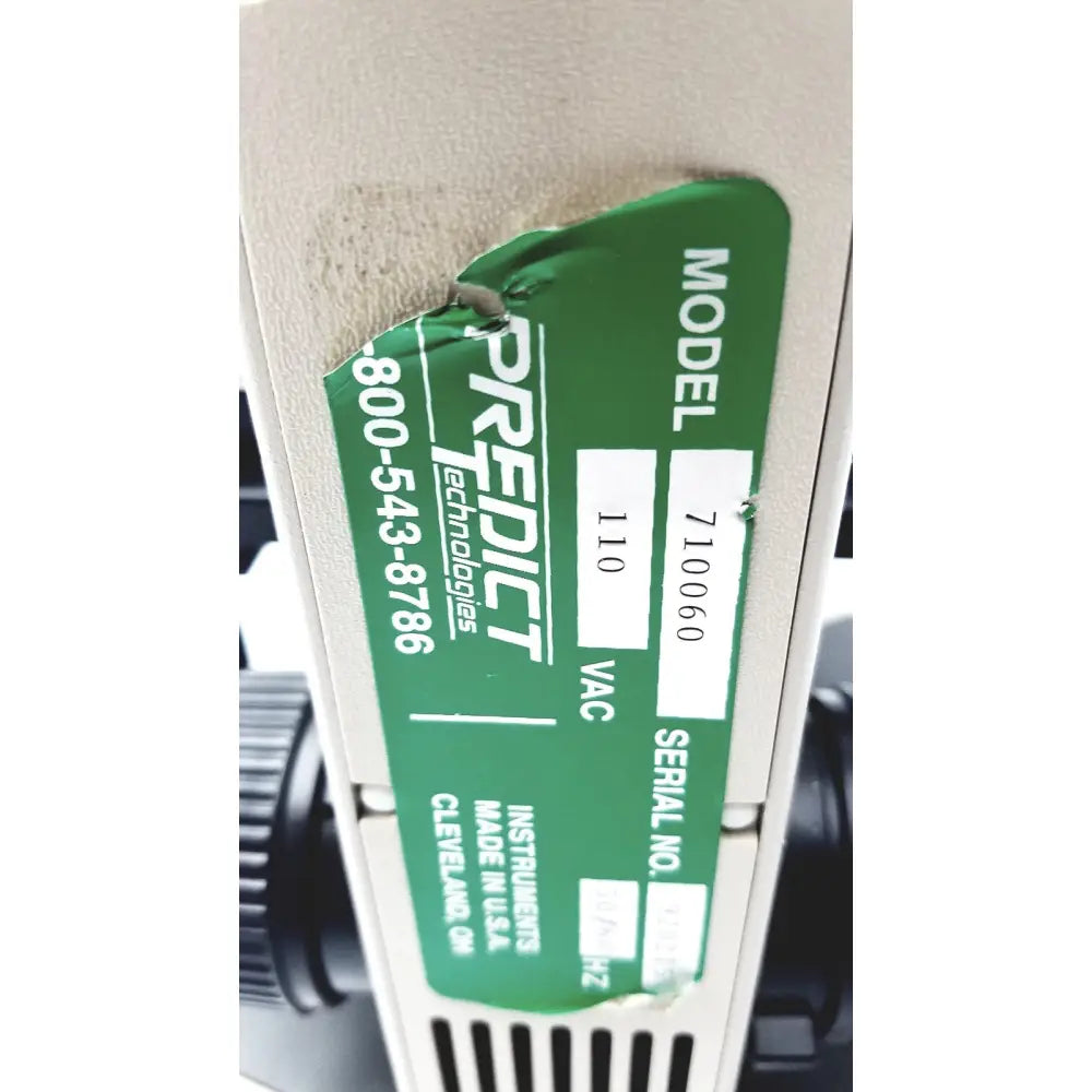 Green label on beige predict technologies instrument on the olympus optical bh2-uma microscope showcasing key features
