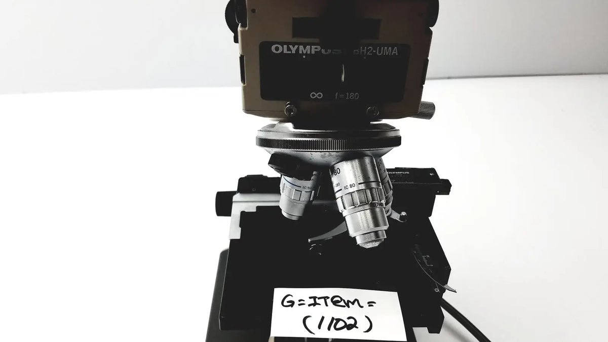 Olympus optical bh2-uma microscope with metallic silver and black components for precise laboratory analysis