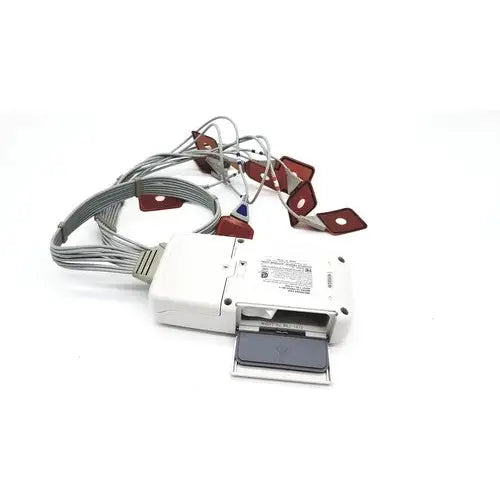 White plastic olympus re-1 endocapsule recorder with gray cables and red electrode pads lead set for medical use