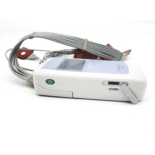 White plastic portable olympus re-1 endocapsule recorder with gray cables and red electrode pads lead set