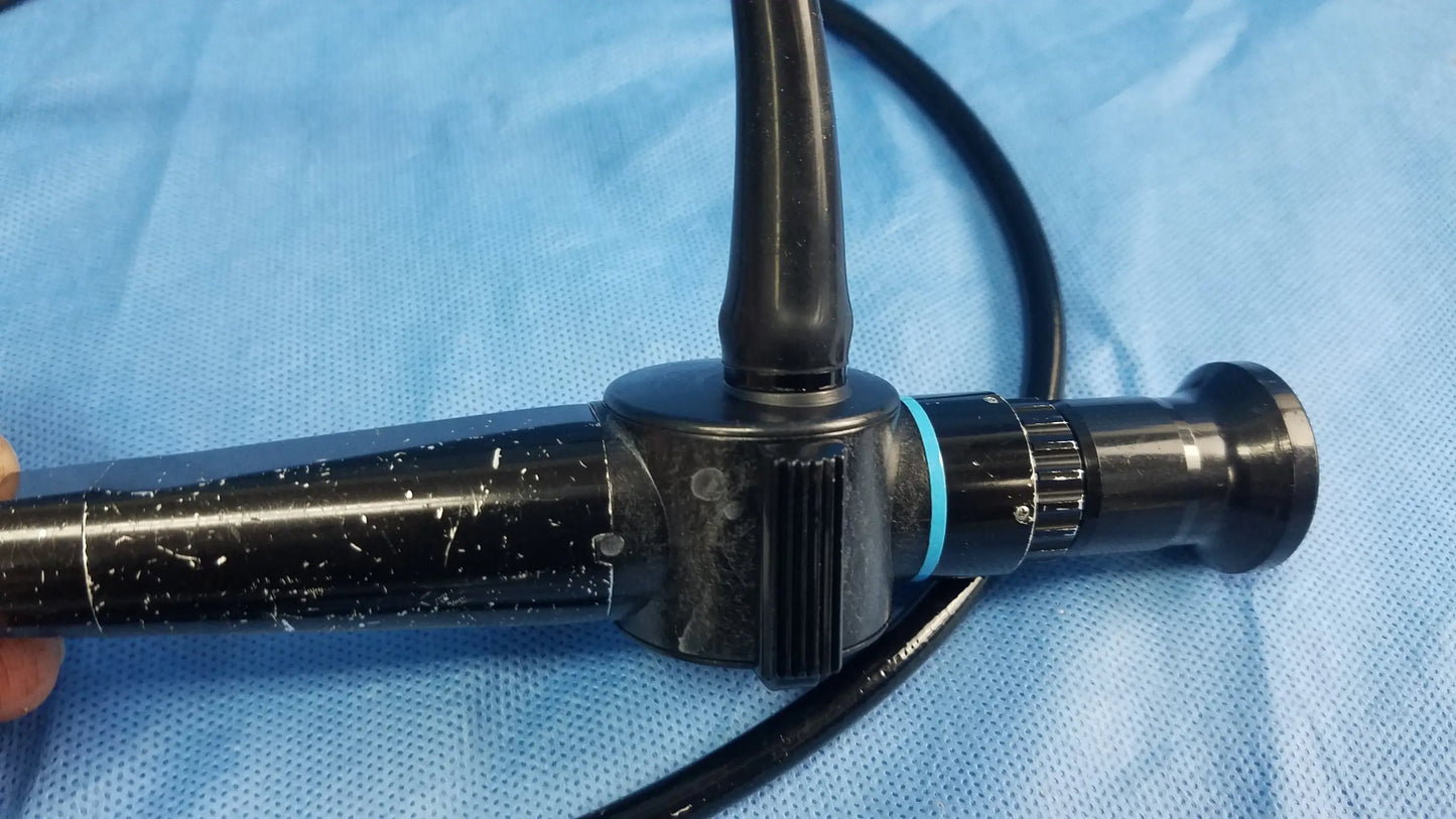 Black olympus rhino-laryngoscope enf-p4 fiber optic endoscope with textured grip and blue accent ring
