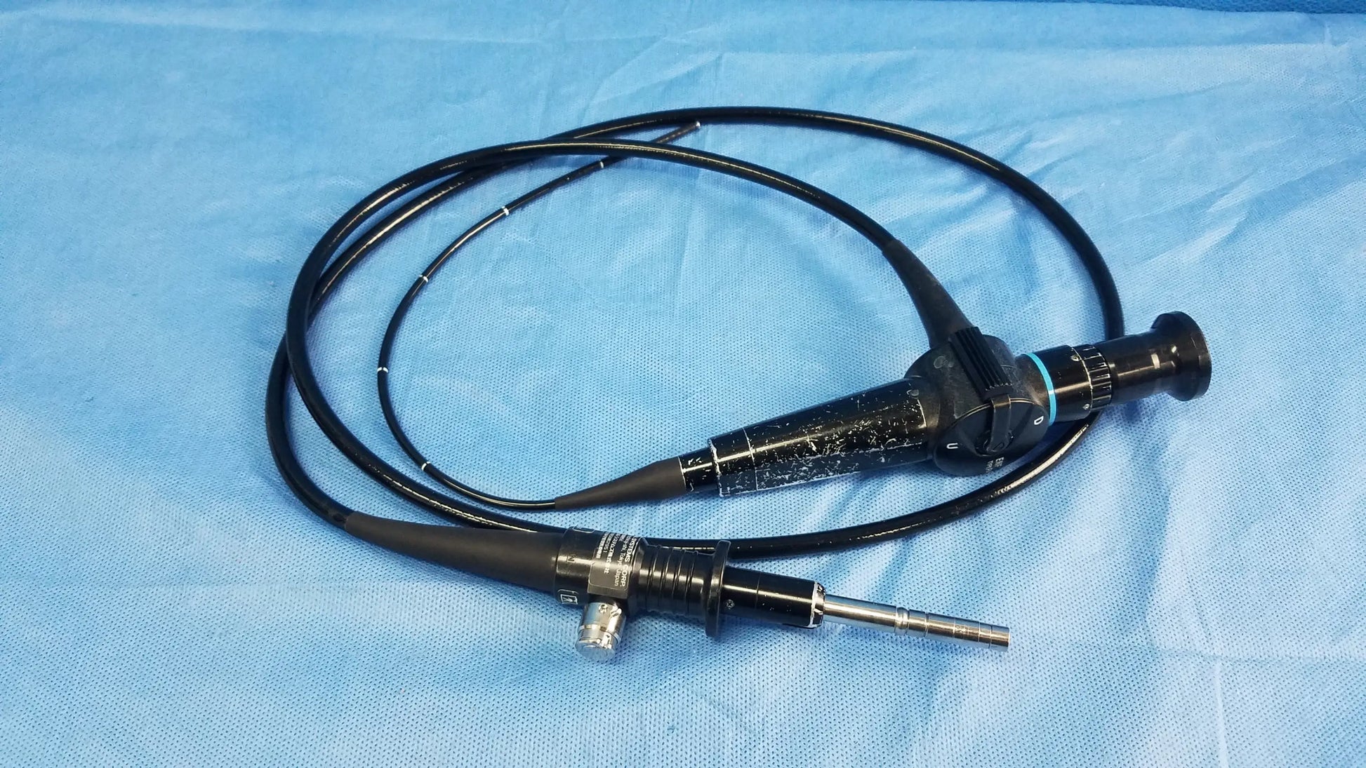 Black olympus rhino-laryngoscope enf-p4 fiber optic endoscope with flexible coiled cable and metallic tip