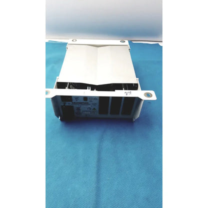 White metal olympus separation transformer maj-1647 set b with rectangular body and visible internal components