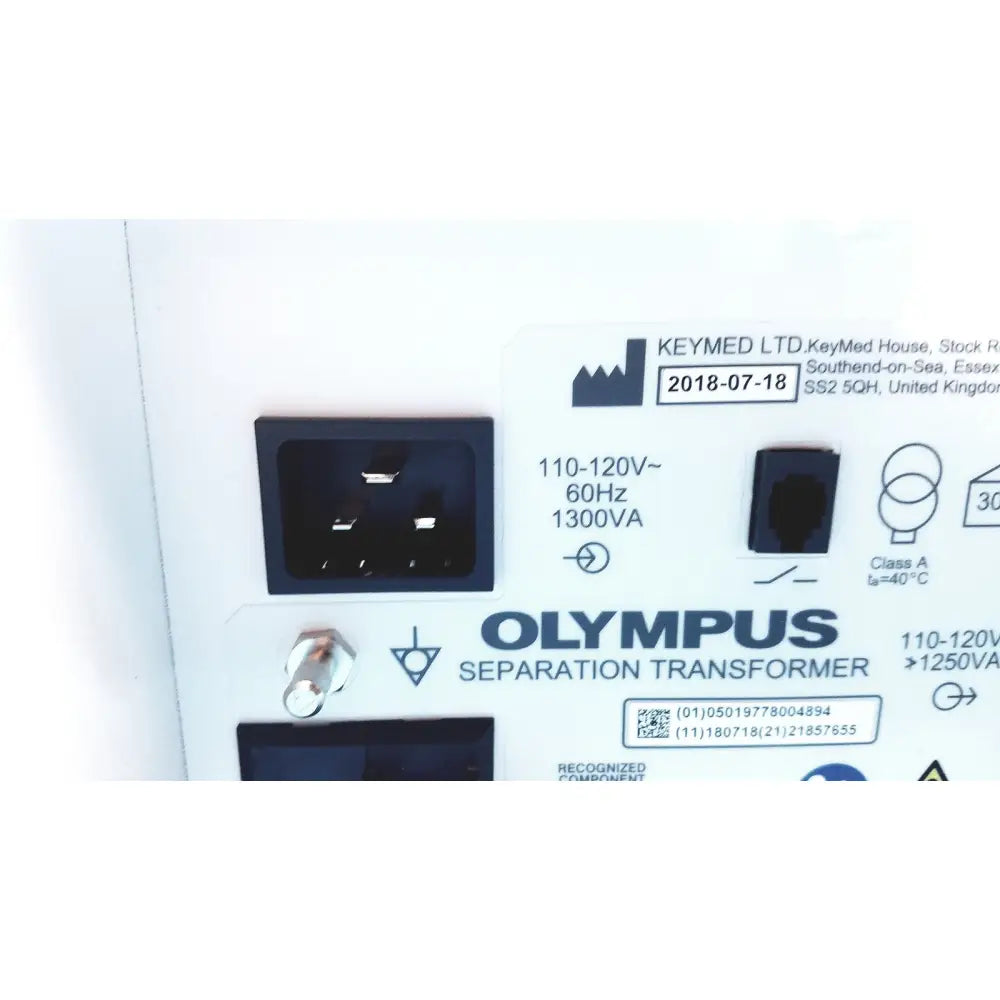 Image of the back side of an olympus separation transformer maj-1647 set b with black power input socket and white label
