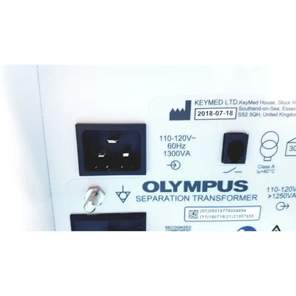 Image of the back side of an olympus separation transformer maj-1647 set b with black power input socket and white label