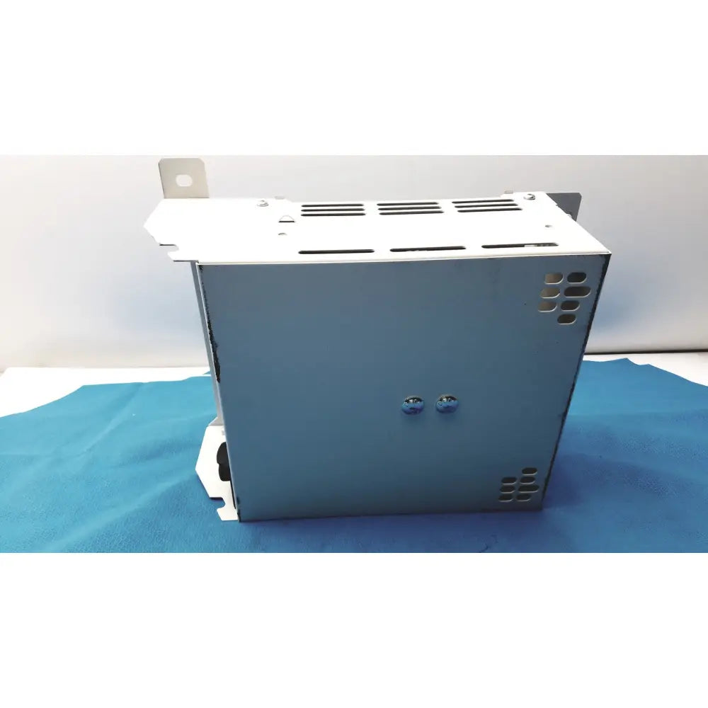 Gray metal industrial olympus separation transformer power supply unit with ventilation slots and mounting brackets