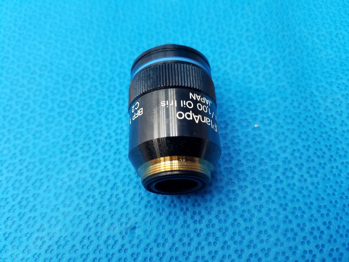 Olympus uplanapo 40x microscope objective black oil immersion lens with gold threaded mount and numerical aperture 1.00 marked japan