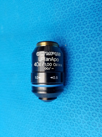 Black olympus uplanapo 40x/1 00 oil iris microscope objective lens with gold threaded top and blue accent ring numerical aperture