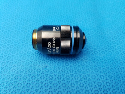 Olympus UPlanApo 40x microscope objective lens with 1.00 numerical aperture oil iris and gold threaded mount