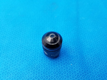 Black olympus uplanapo 40x microscope objective lens with metallic aperture and engraved numerical aperture markings