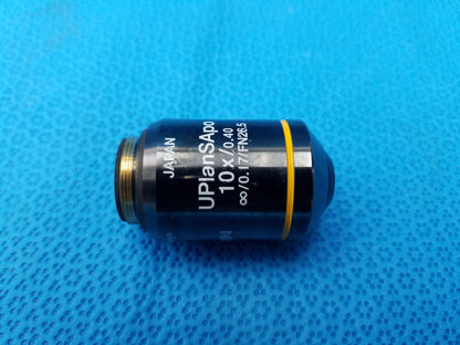 Black microscope objective lens with gold threaded mount and yellow ring compatible Olympus UPlanSApo 10x 0.40