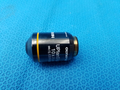 Black Olympus UPlanSApo 10x microscope objective lens with yellow ring and gold threaded mount compatible Olympus model