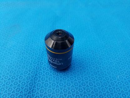 Black and yellow microscope objective lens with upm branding compatible olympus uplansapo 10x for precise imaging