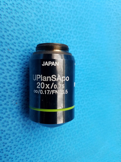 Black Olympus uplansapo 20x/0.75 microscope objective lens with green ring labeled numerical aperture and field number japan