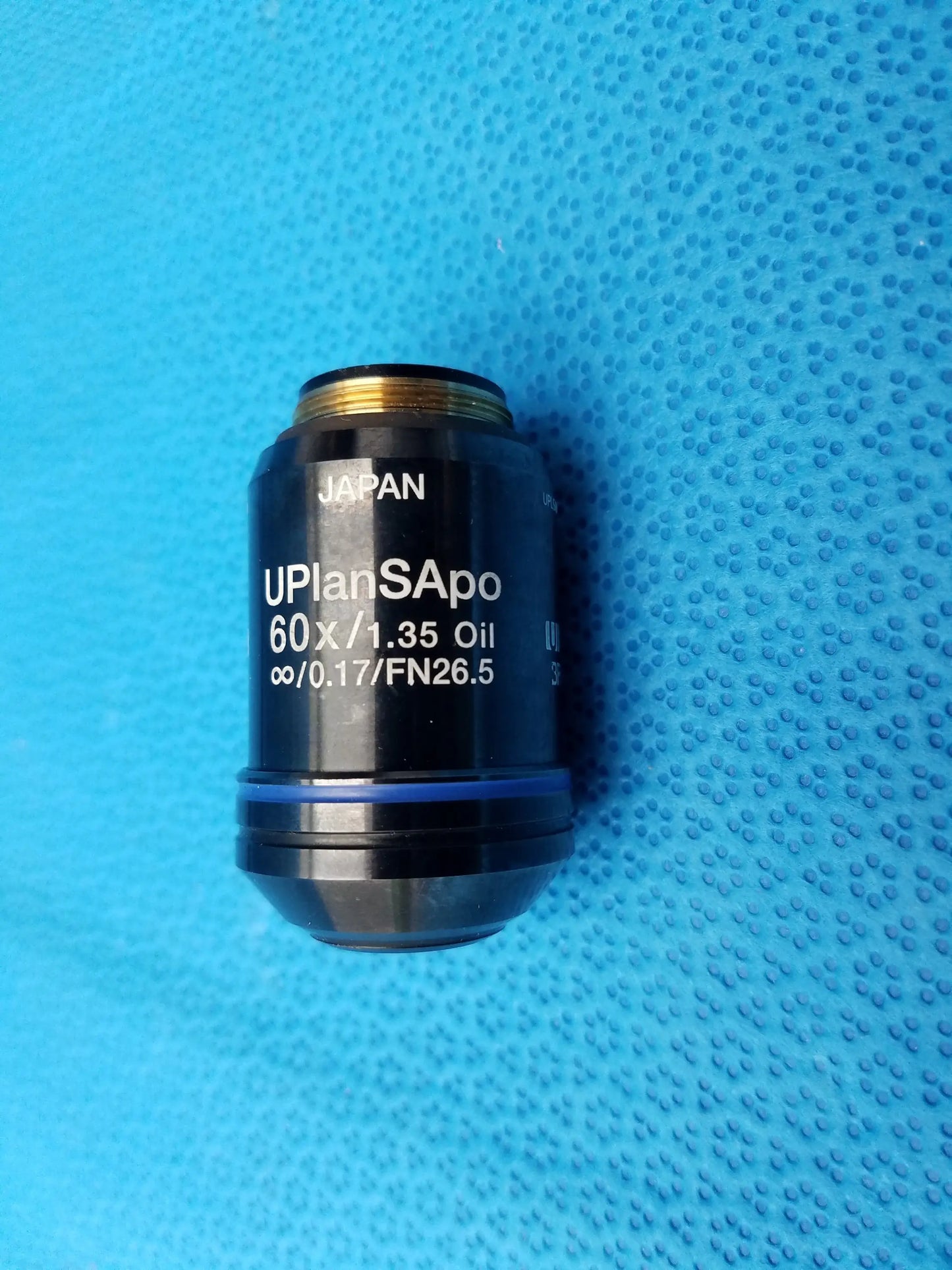 Olympus UPlanSApo 60x oil immersion microscope objective lens with gold threading blue ring numerical aperture and field number