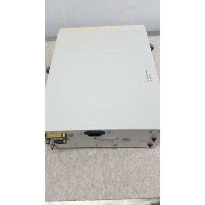 White rectangular Olympus Visera CLV-S40 emergency lamp with metallic connectors and gold-plated port on side