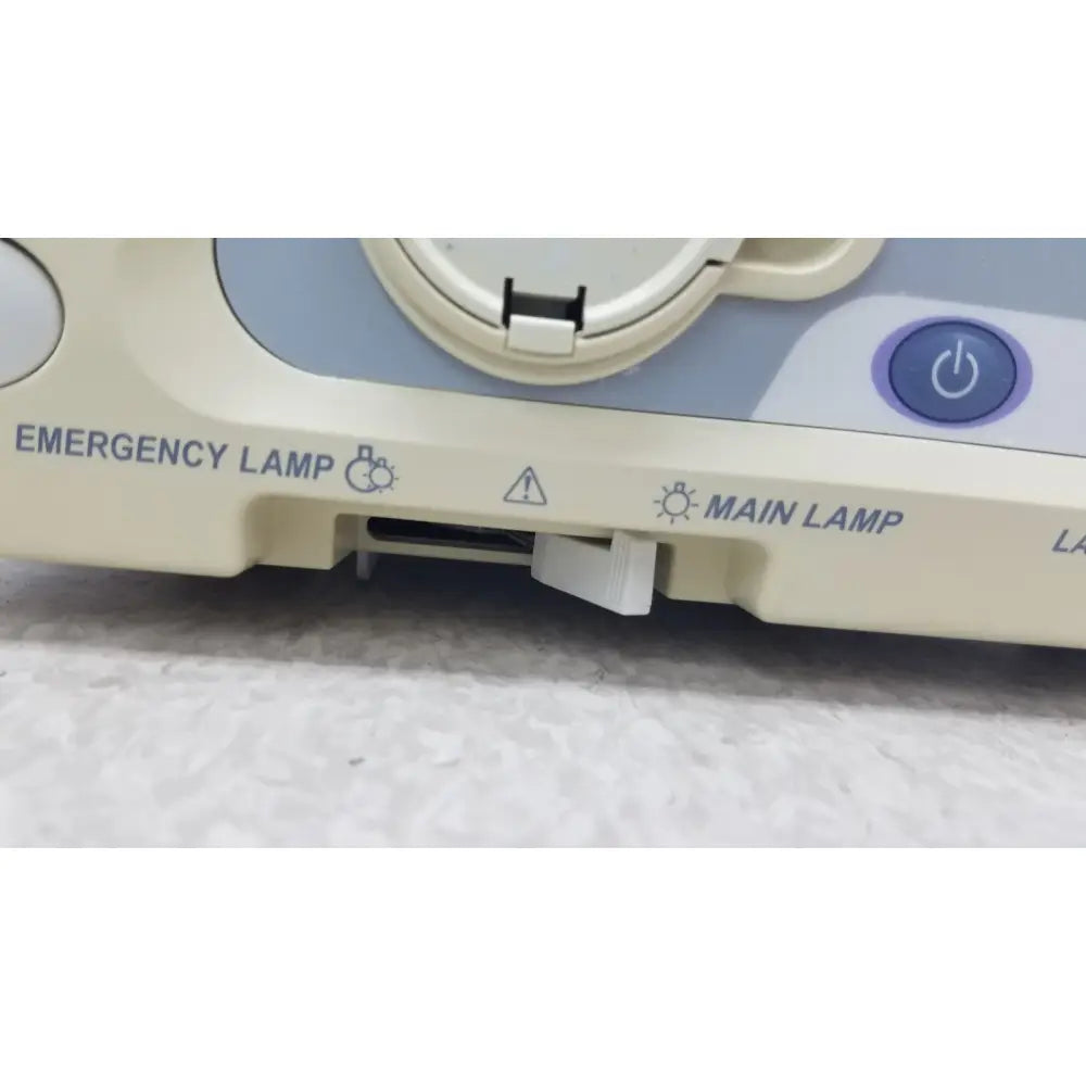 Beige olympus visera clv-s40 medical device with blue accents and labeled controls for emergency lamp functions