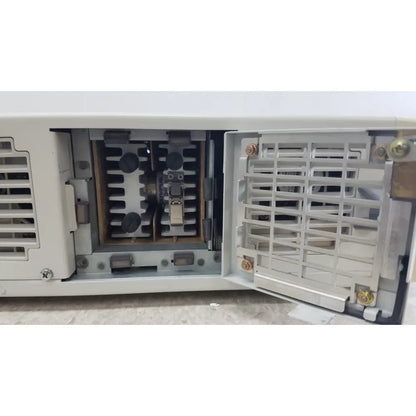 White industrial-grade electrical switchgear cabinet with open doors showing internal components for olympus visera clv-s40 emergency lamp