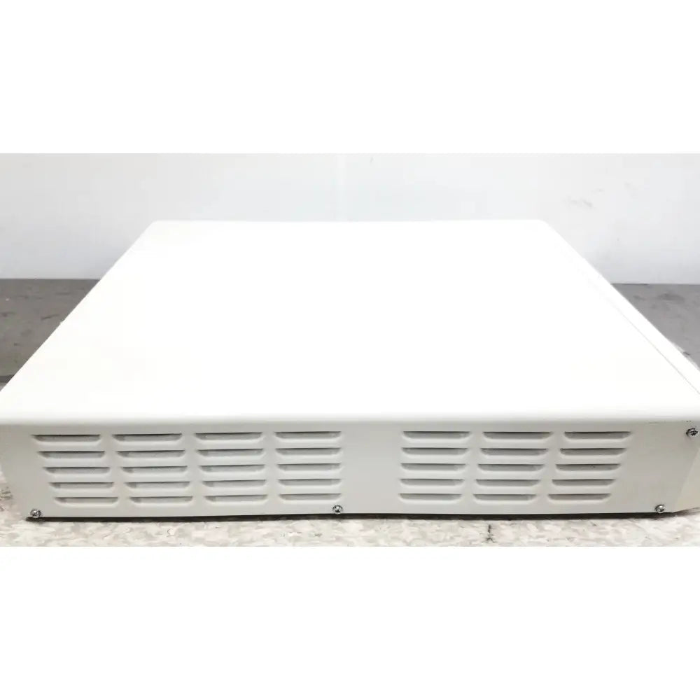 White rectangular olympus visera elite video system otv-s190 server rack with horizontal ventilation slats at bottom edge