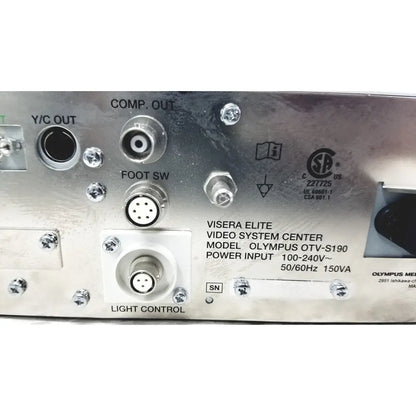 Silver metallic olympus visera elite video system otv-s190 back side showing labeled ports and certification marks