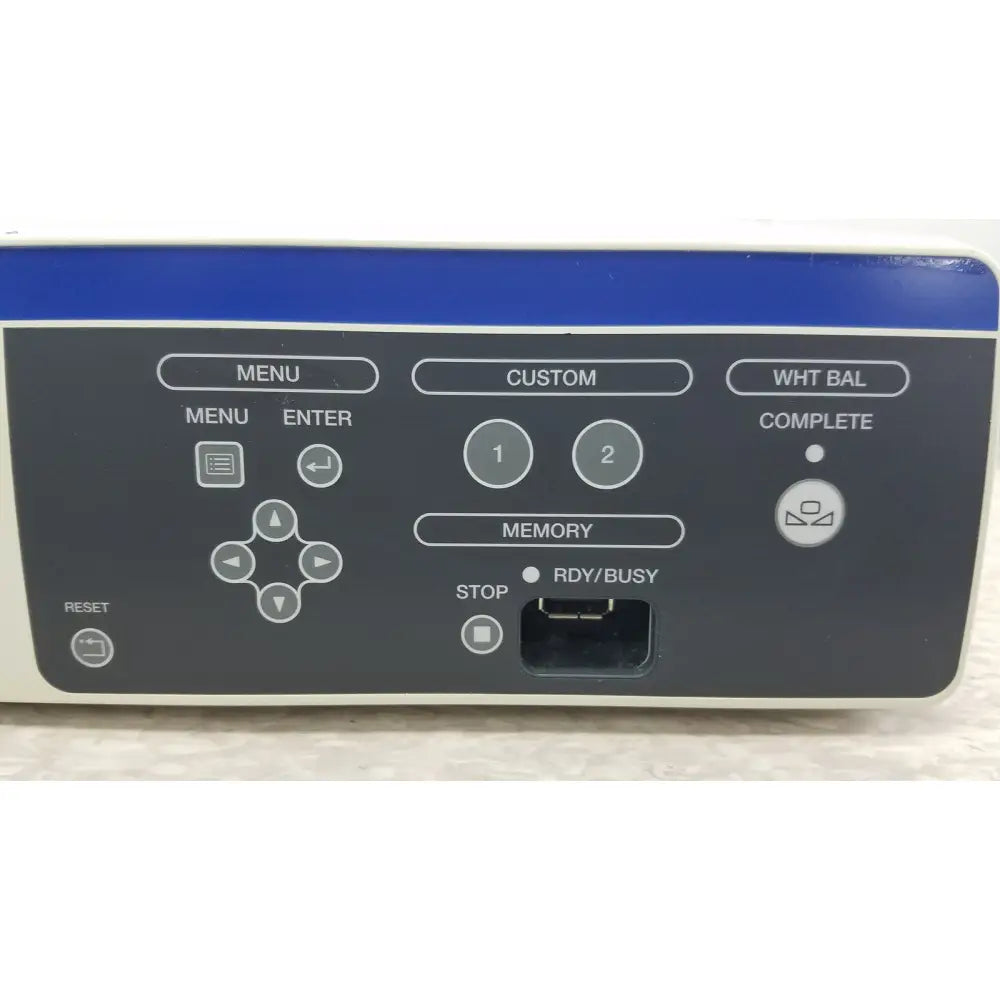 Blue and black control panel of the olympus visera elite video system otv-s190 with labeled menu and memory buttons
