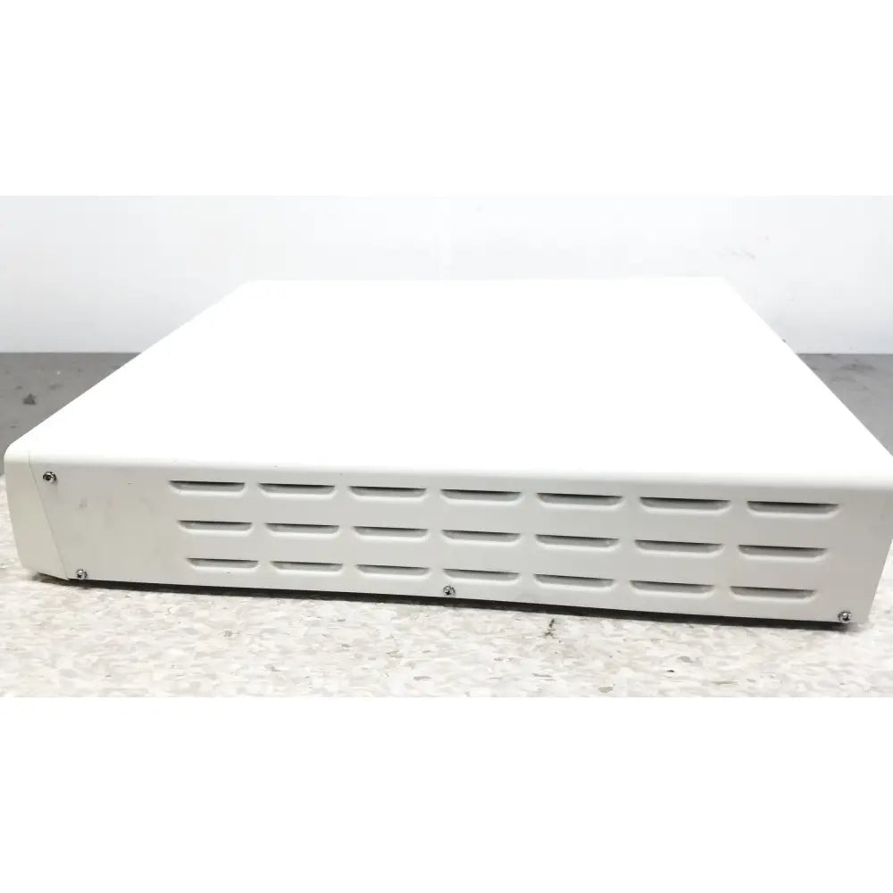 White rectangular electronic device with horizontal ventilation slots, an olympus visera elite video system otv-s190 model