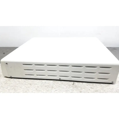 White rectangular electronic device with horizontal ventilation slots, an olympus visera elite video system otv-s190 model