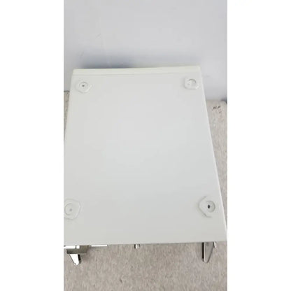 White rectangular plastic box with metal feet and mounting holes on the back of olympus visera elite xenon clv-s190 light source