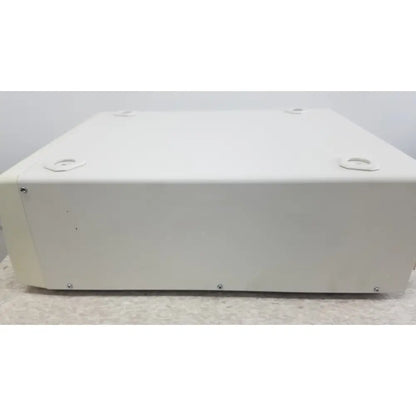 White rectangular metal box with four circular indentations and screws on edges of olympus visera elite xenon light source