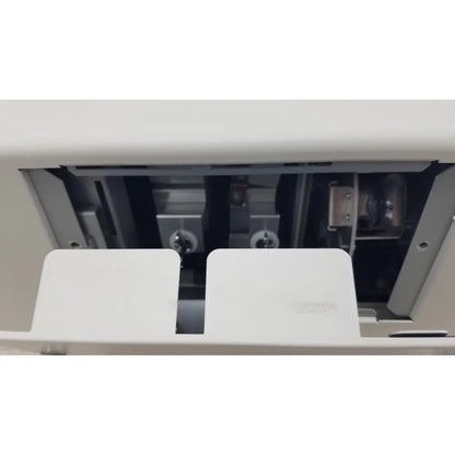 White plastic cassette tape compartment with metallic gears and rollers inside olympus visera elite xenon clv-s190 light source