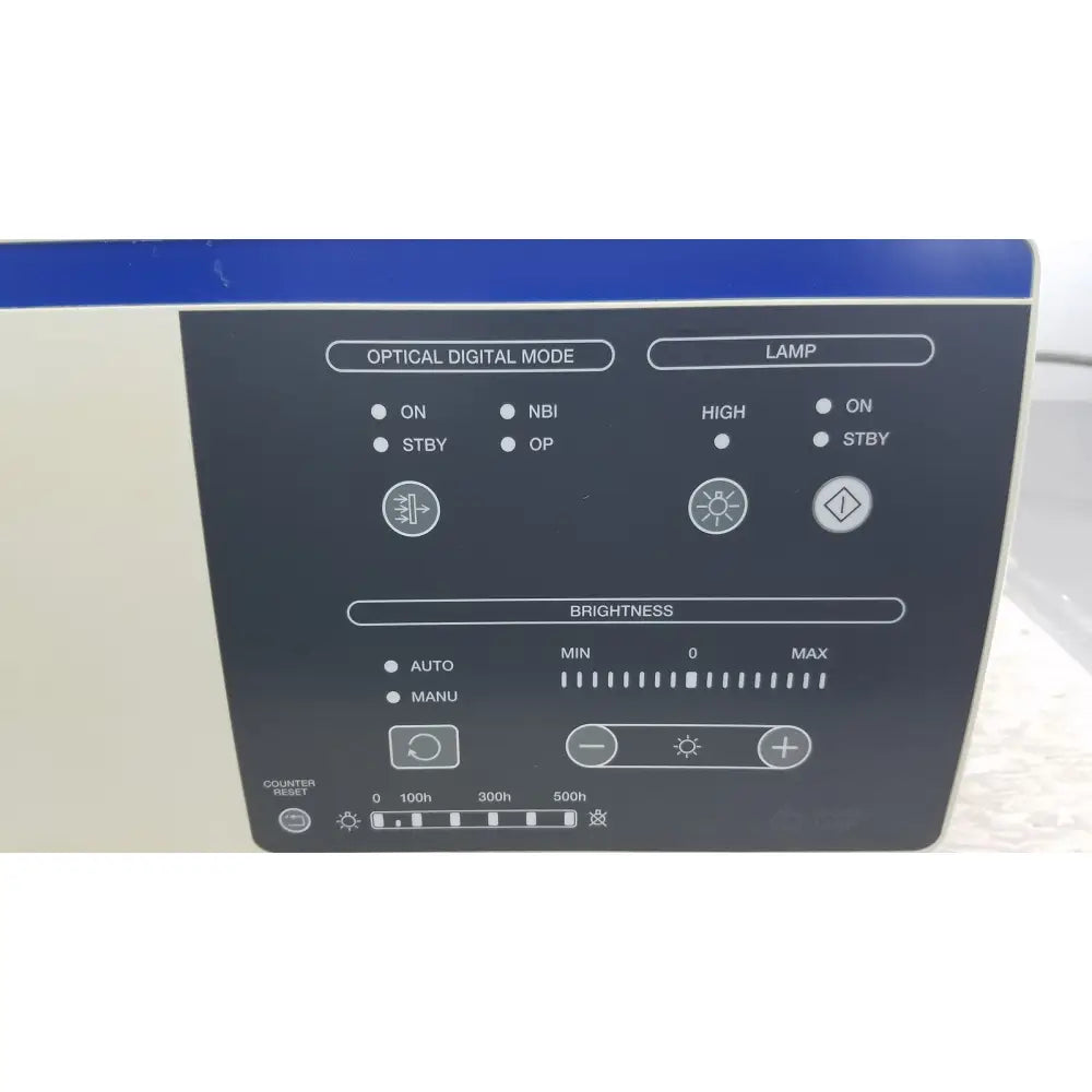 Black control panel of olympus visera elite xenon clv-s190 light source with white labels for lamp brightness and counter reset