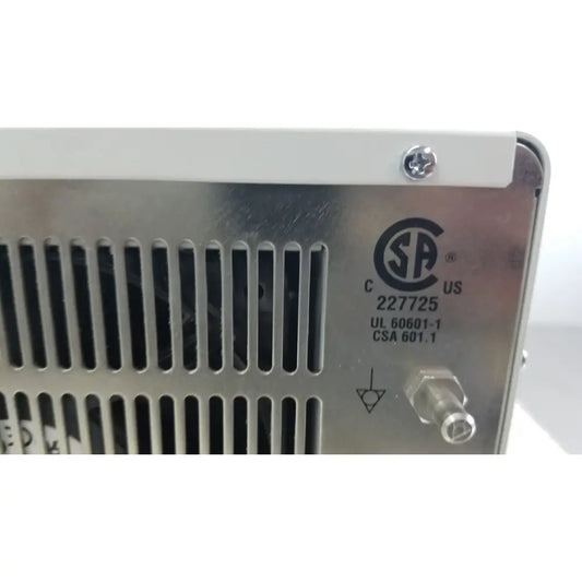 Silver metallic olympus visera elite xenon clv-s190 light source with vertical slotted ventilation grille and white top panel