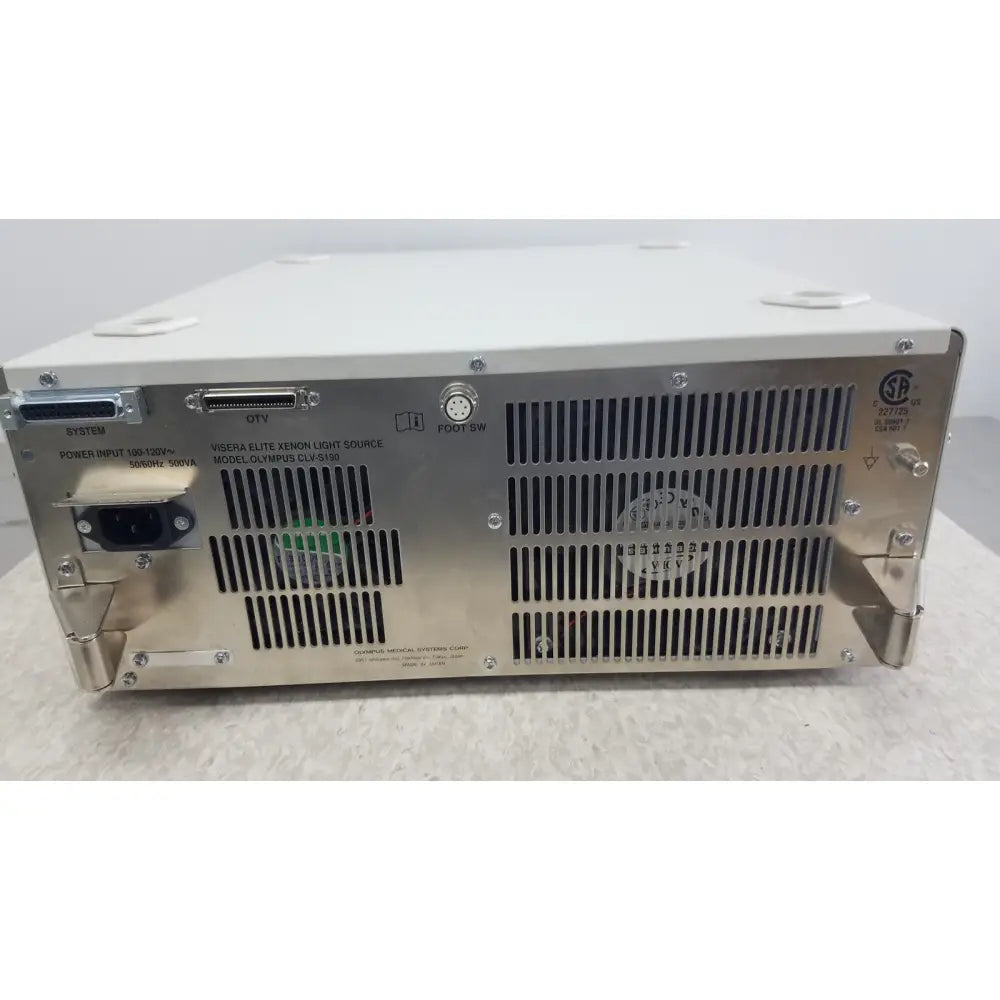 Silver metallic industrial-grade olympus visera elite xenon light source with vented rear panel model cx-5300