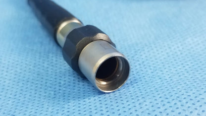 Black and silver Olympus WA03200A S fiber optic light cable with threaded metallic connector for medical endoscope use
