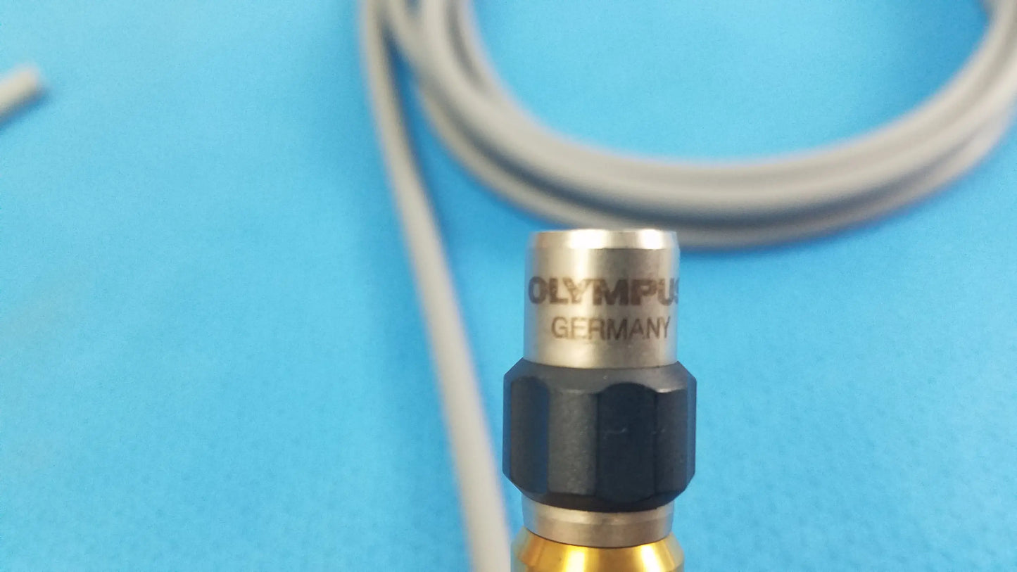 Olympus wa03300a light guide featuring a metallic sensor head with black hexagonal collar and gold base for medical equipment