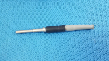 Silver and black metal olympus wa03300a light guide cable with textured grip for medical equipment use