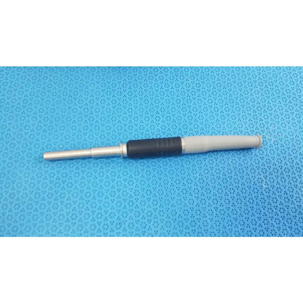 Silver and black metal olympus wa03300a light guide cable with textured grip for medical equipment use