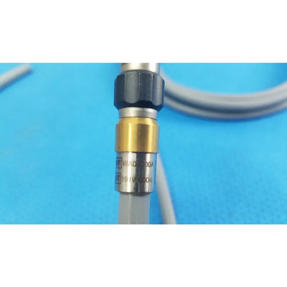 A metallic pressure gauge with black hexagonal nut gold band and silver body for olympus wa03300a light guide medical equipment