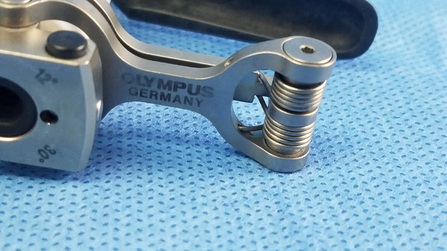 Silver metallic passive monopolar working element with olympus germany engraving and coiled spring mechanism