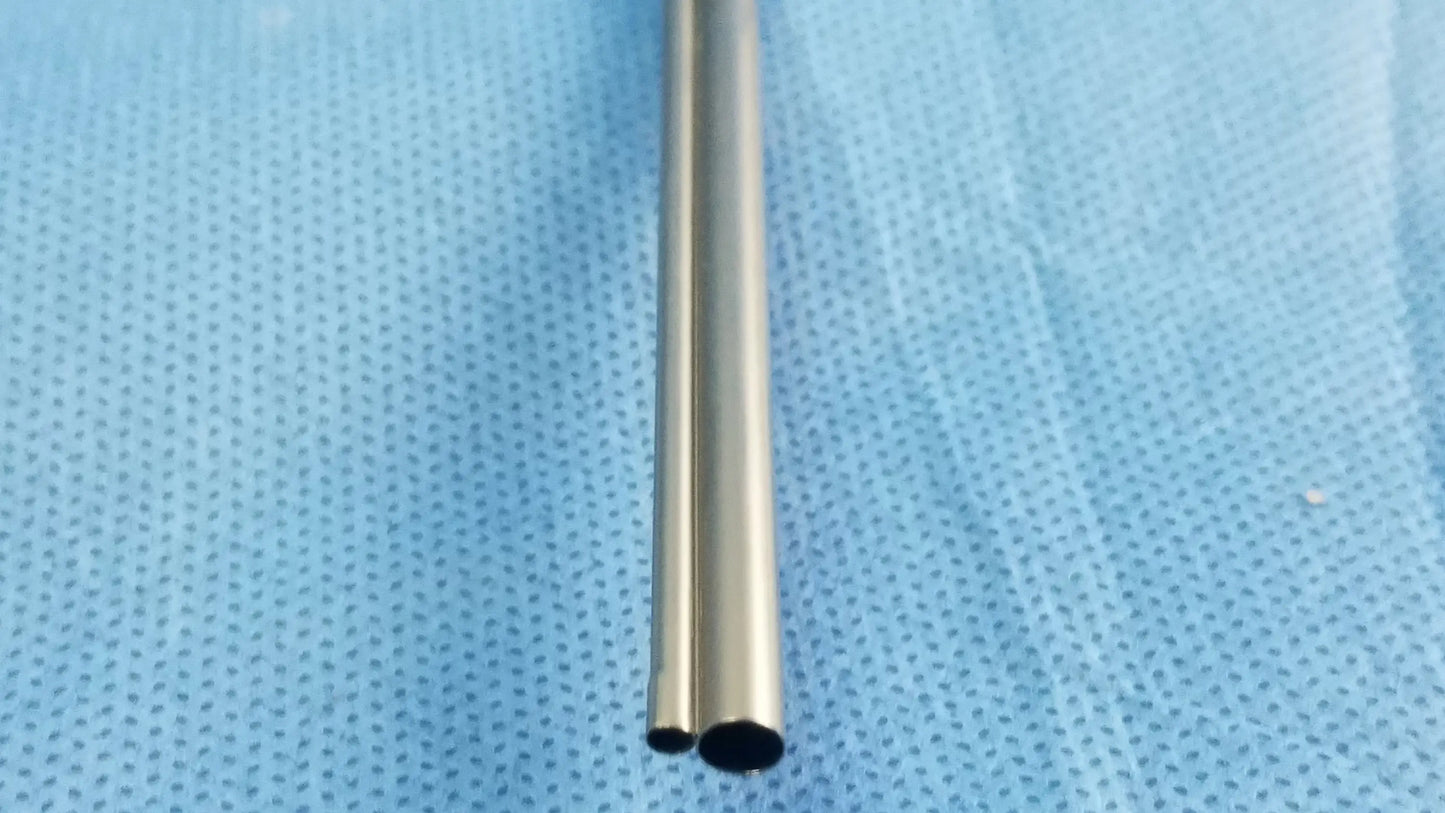 A sleek metallic silver passive monopolar working element with polished cylindrical tube for surgical use olympus wa22067a