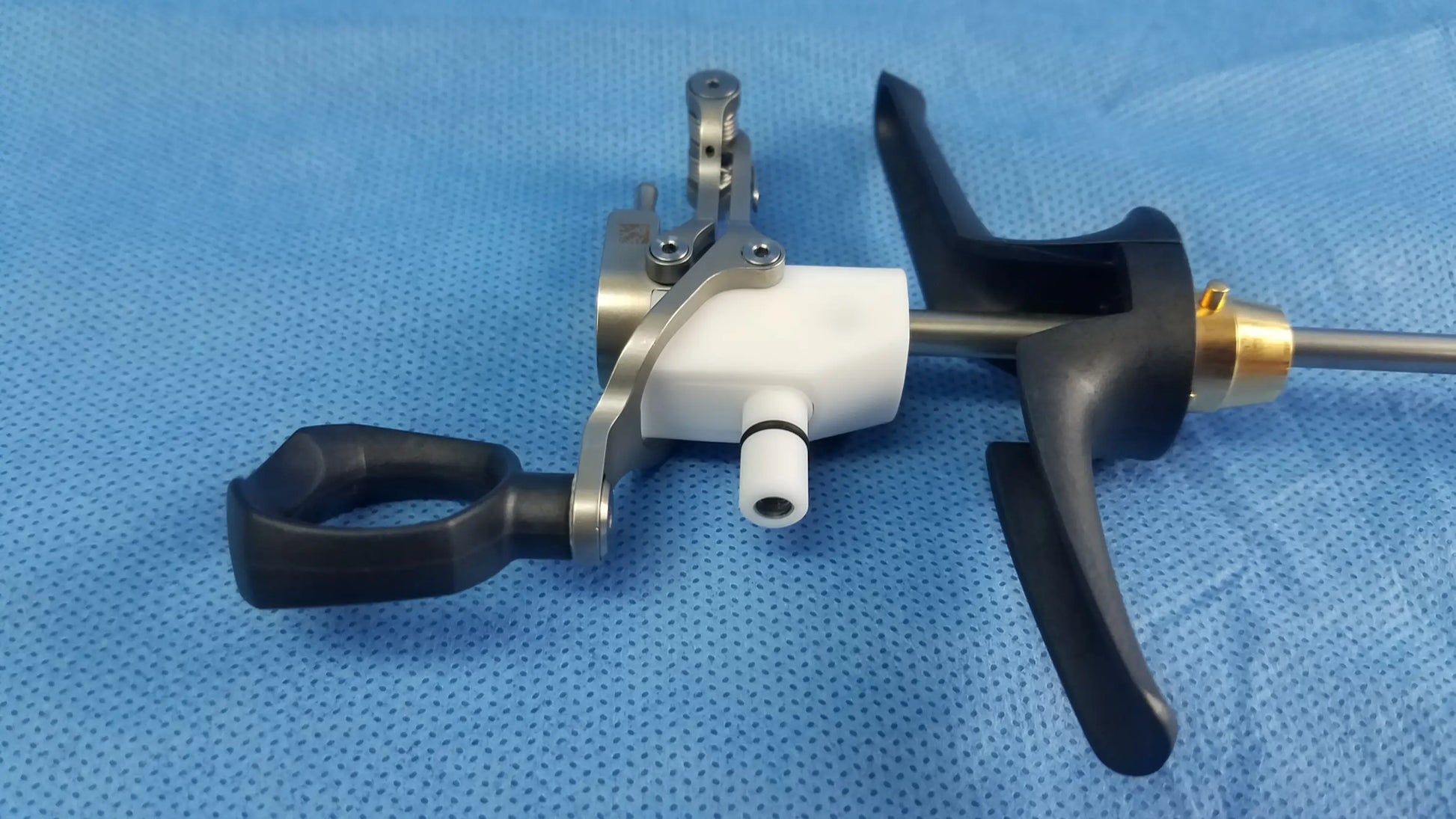 Black and silver Olympus WA22367A bipolar passive working element with white plastic component for surgical use