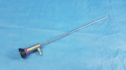 Silver oes elite wa2t430a rigid telescope with a black red and blue rubberized handle for surgical use