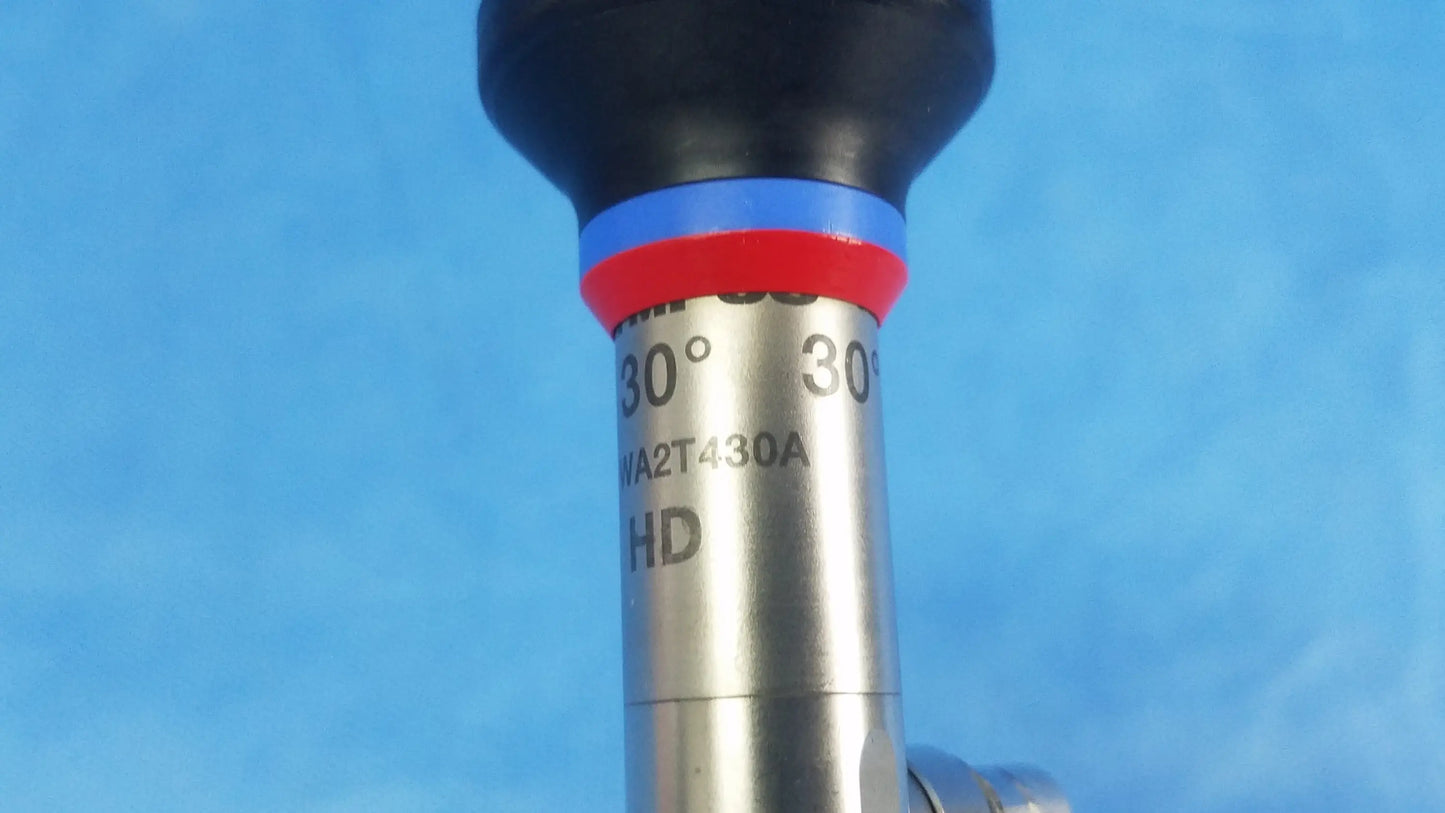 Silver metallic oes elite rigid telescope wa2t430a with black handle and red blue bands for endoscopic use